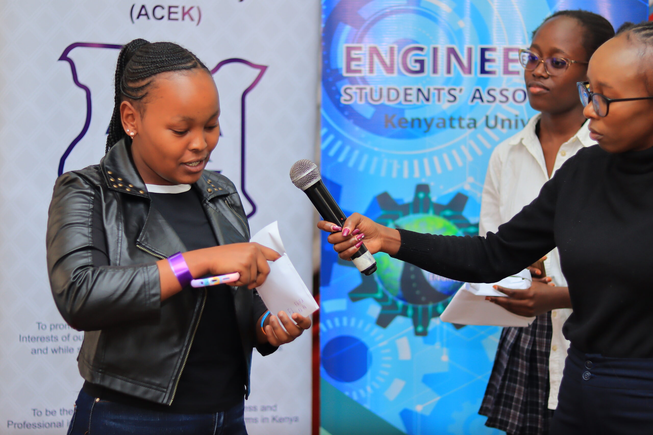 Mentee being awarded